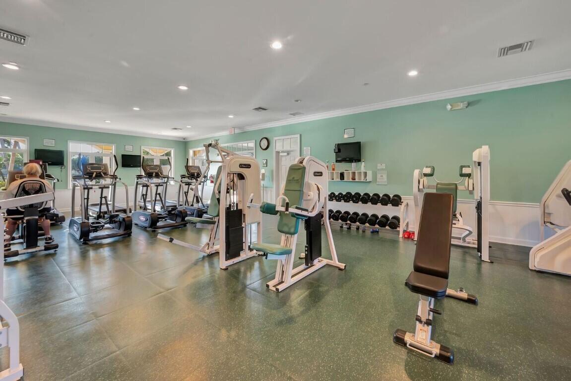 17 Harbour Isle Drive West, Unit 103 Fort Pierce, FL 34949 - Photo 13 of 17 a view of a room with gym equipment