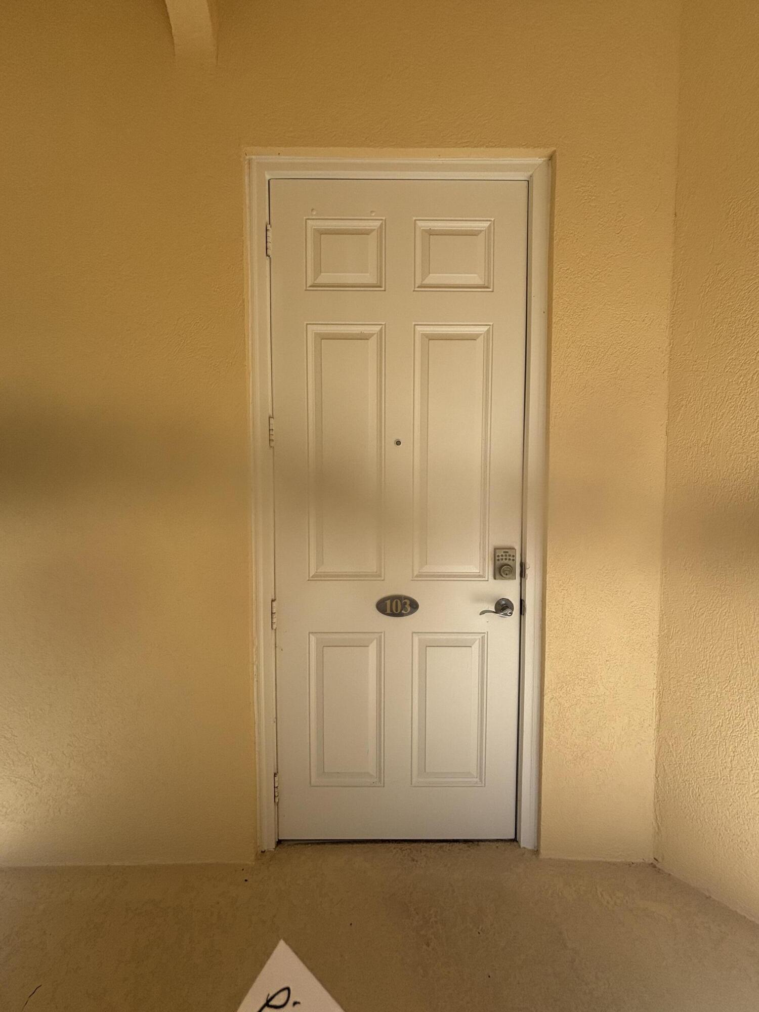 17 Harbour Isle Drive West, Unit 103 Fort Pierce, FL 34949 - Photo 17 of 17 an empty room with windows