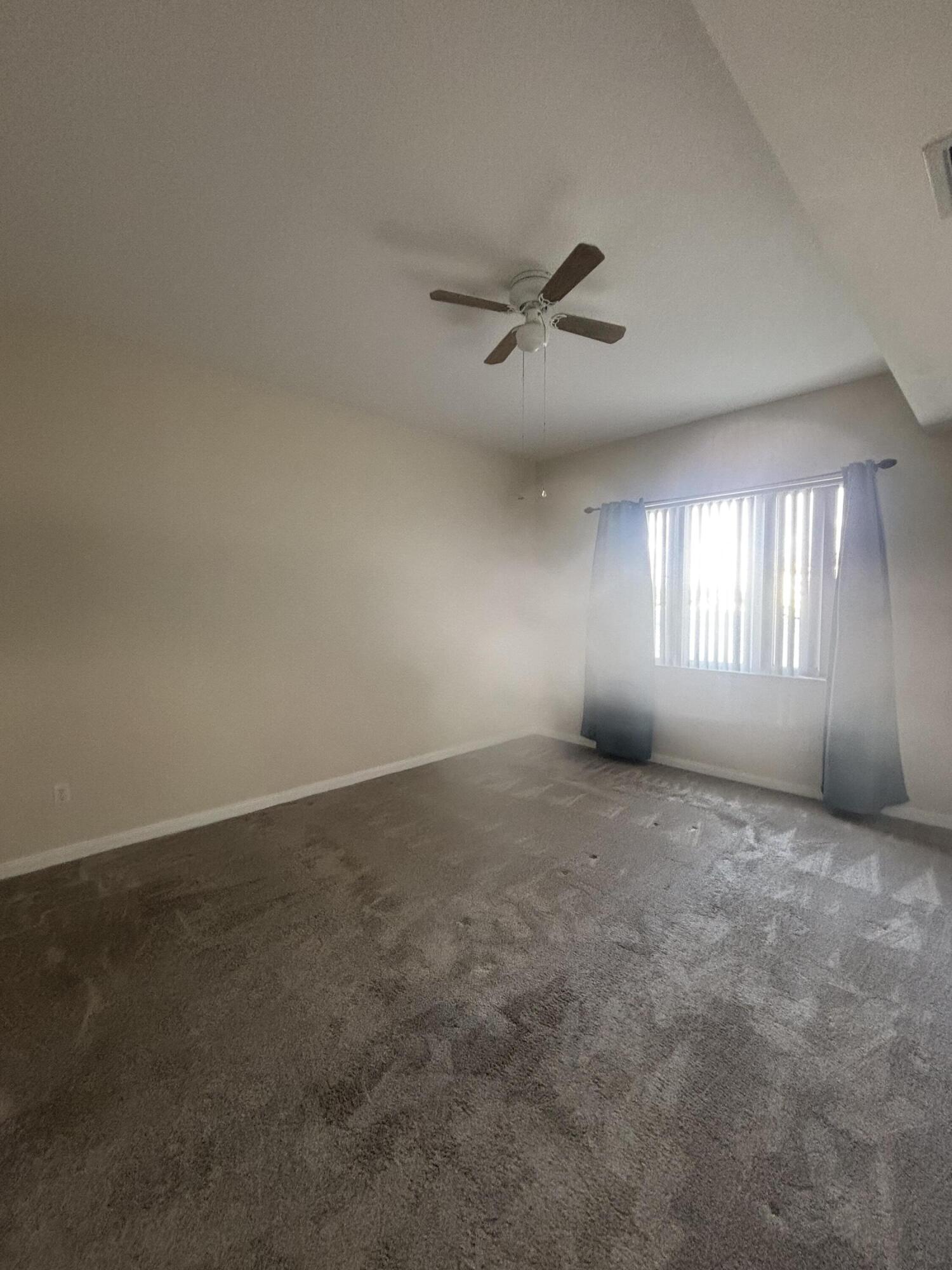 17 Harbour Isle Drive West, Unit 103 Fort Pierce, FL 34949 - Photo 9 of 17 a view of an empty room with a window