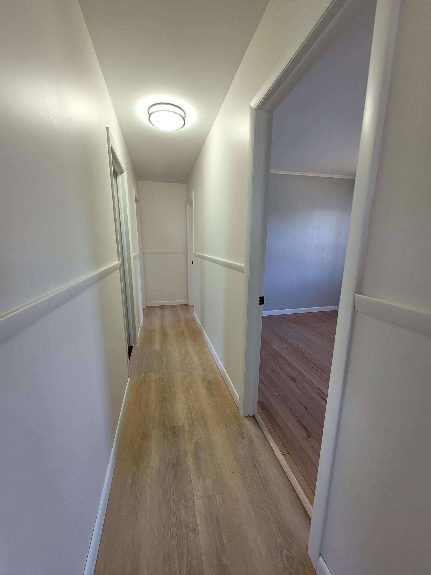 200 Augusta Road Winslow, ME 04901 - Photo 11 of 29 Hall to bathroom & bedrooms