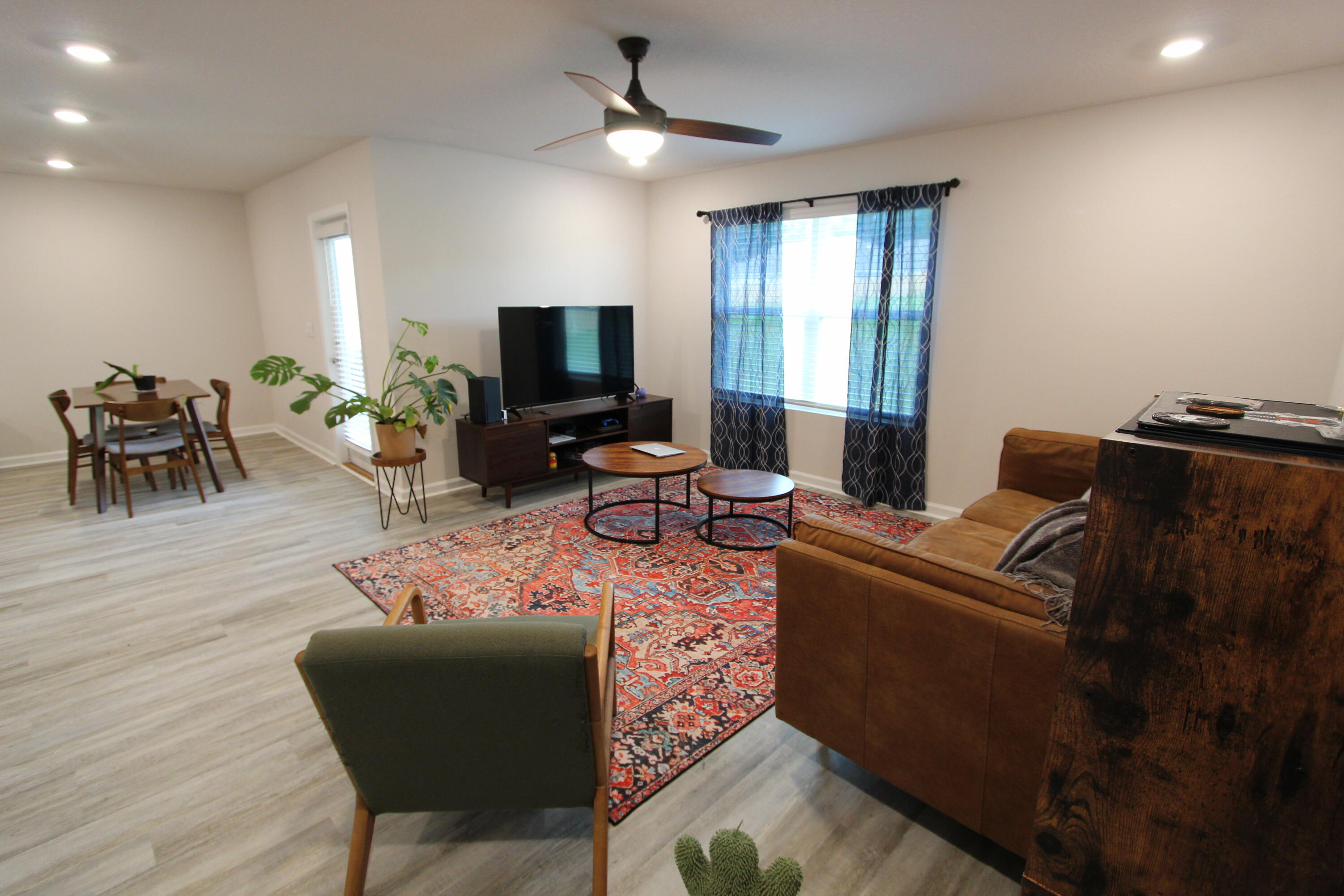 3063 Jane Lane Crestview, FL 32539 - Photo 22 of 30 a living room with furniture and a flat screen tv