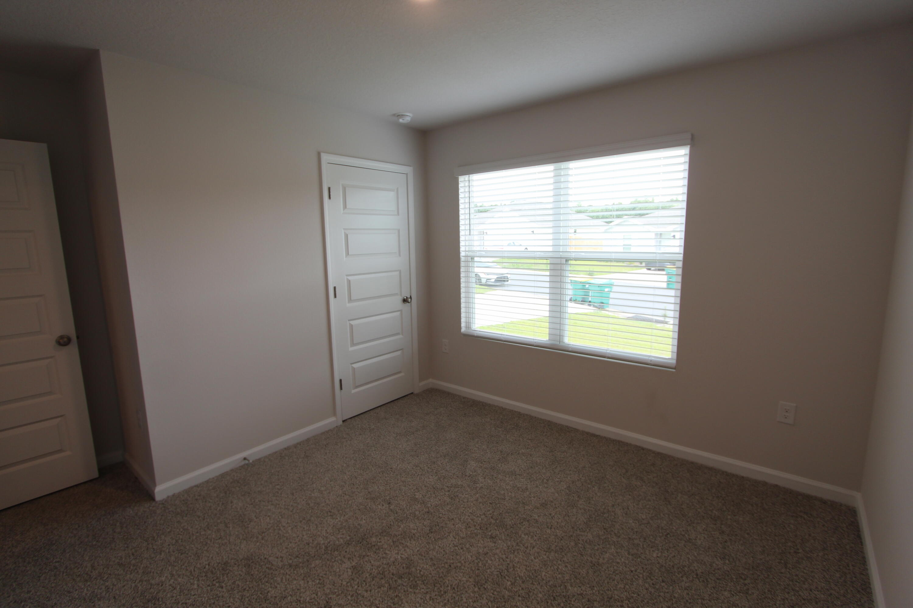 3063 Jane Lane Crestview, FL 32539 - Photo 8 of 30 an empty room with a window