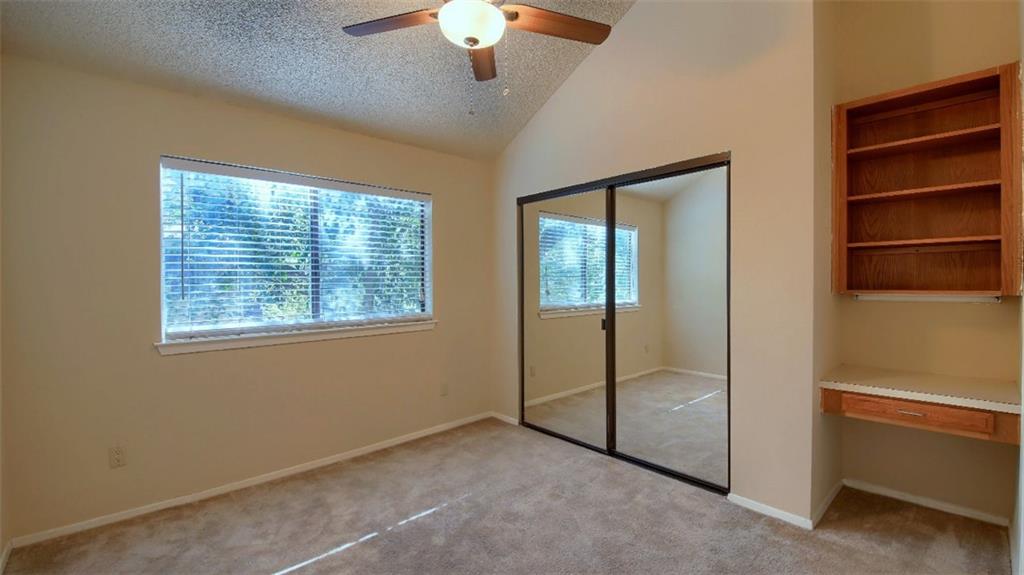 908 Poplar Street, Unit 203 Austin, TX 78705 - Photo 8 of 9 a view of an empty room with a window