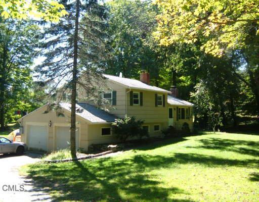 309 Fan Hill Road Monroe, CT 06468 - Photo 1 of 1 a front view of a house with a yard