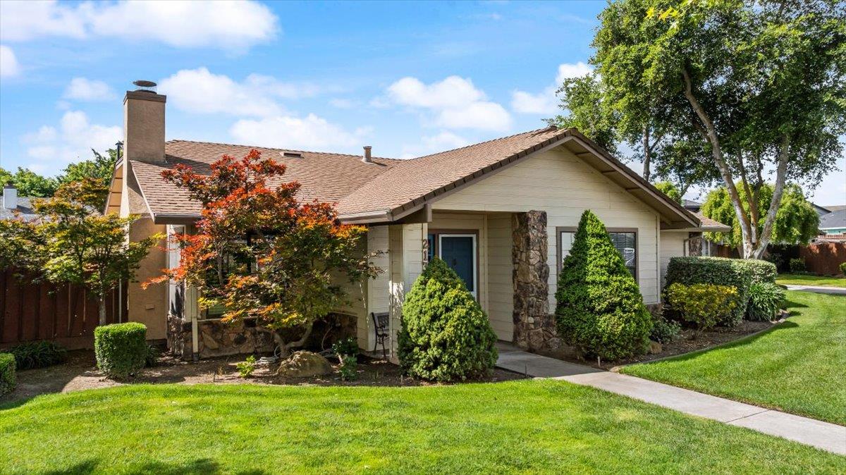 2136 Candy Cane Walk Manteca, CA 95336 - Photo 2 of 60 a front view of a house with garden