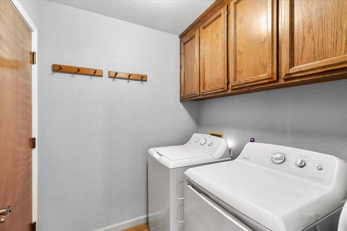 2136 Candy Cane Walk Manteca, CA 95336 - Photo 35 of 60 a utility room with dryer and washer