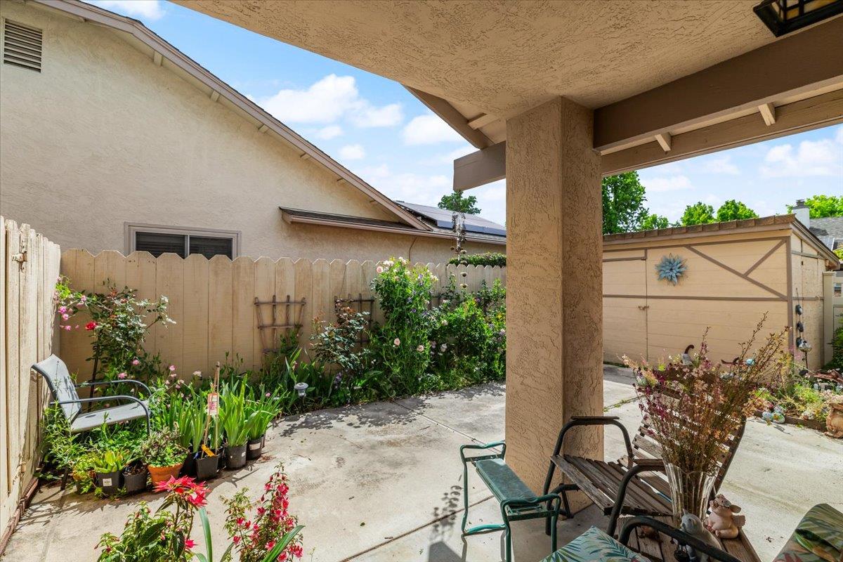 2136 Candy Cane Walk Manteca, CA 95336 - Photo 36 of 60 fenced backyard featuring a patio area and a storage unit