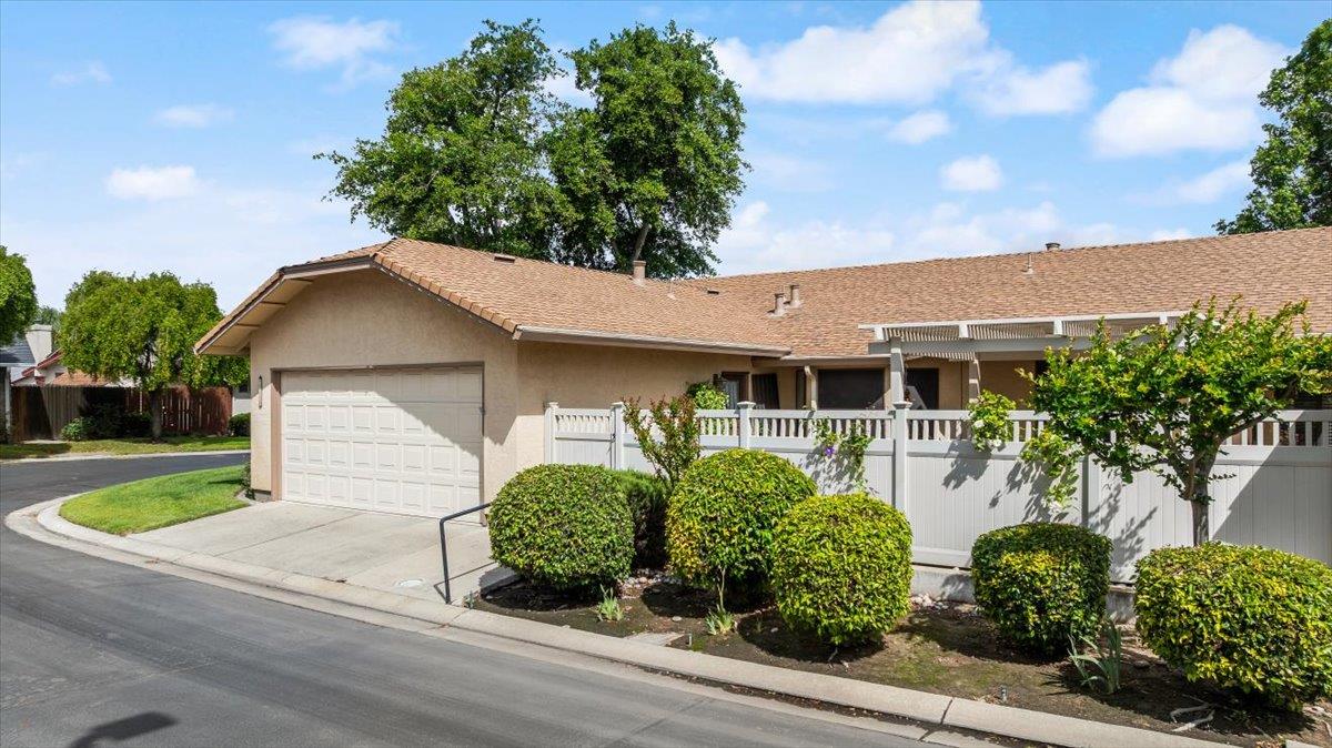 2136 Candy Cane Walk Manteca, CA 95336 - Photo 46 of 60 front view of a house with a yard