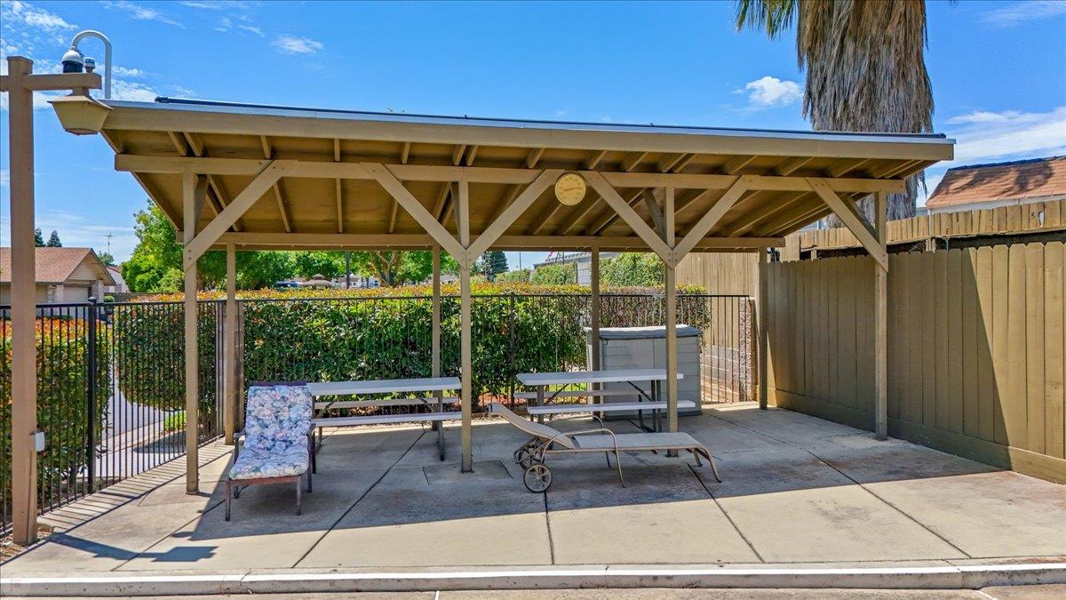 2136 Candy Cane Walk Manteca, CA 95336 - Photo 57 of 60 a view of a swimming pool with a patio