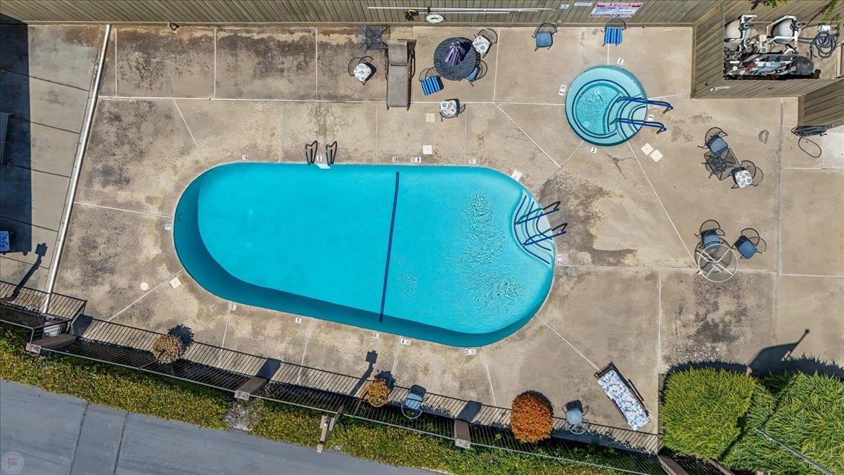 2136 Candy Cane Walk Manteca, CA 95336 - Photo 60 of 60 aerial view of a pool
