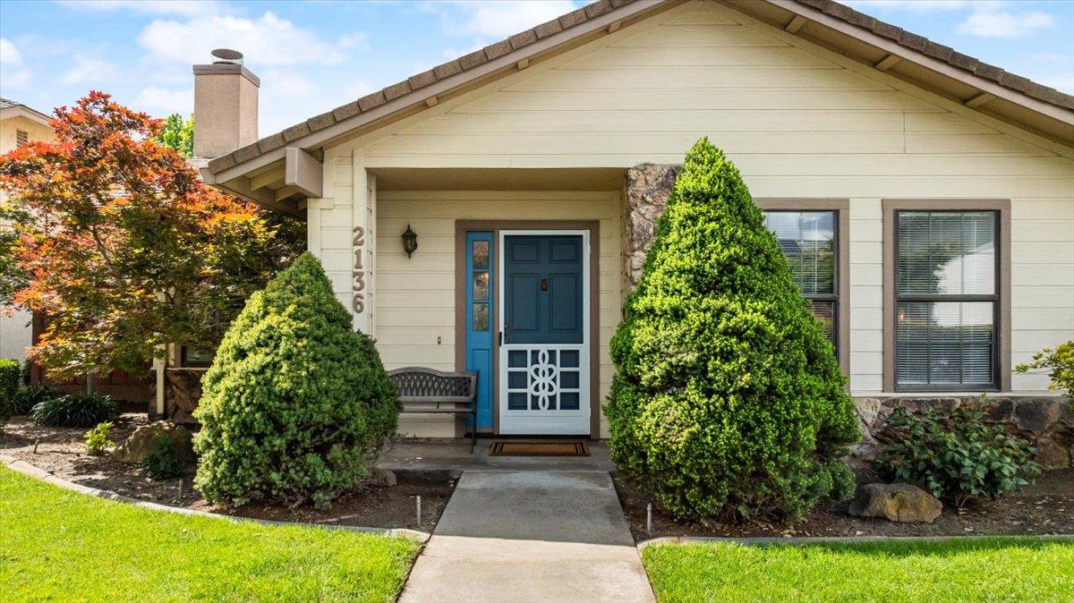 2136 Candy Cane Walk Manteca, CA 95336 - Photo 6 of 60 a front view of a house with garden