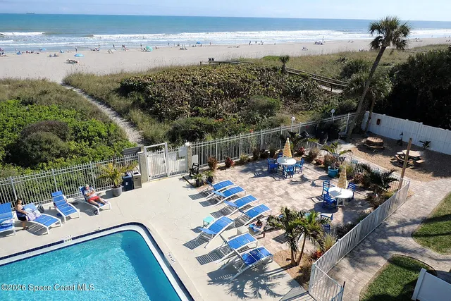 a view of yard with patio