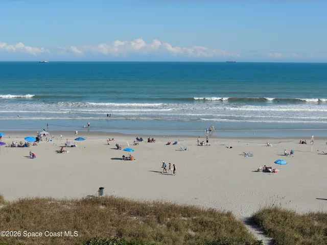 a view of a chairs and table in patio