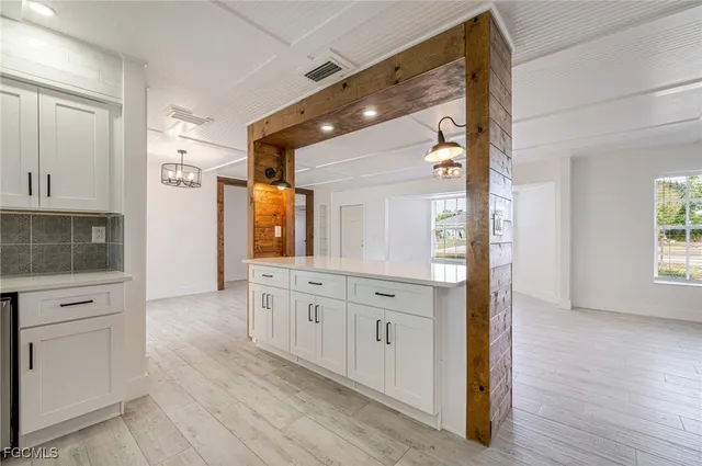 a view of a hallway to a room