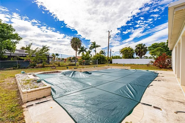 a view of a house with swimming pool