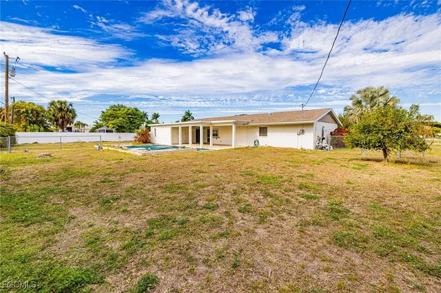 a view of a house with a swimming pool