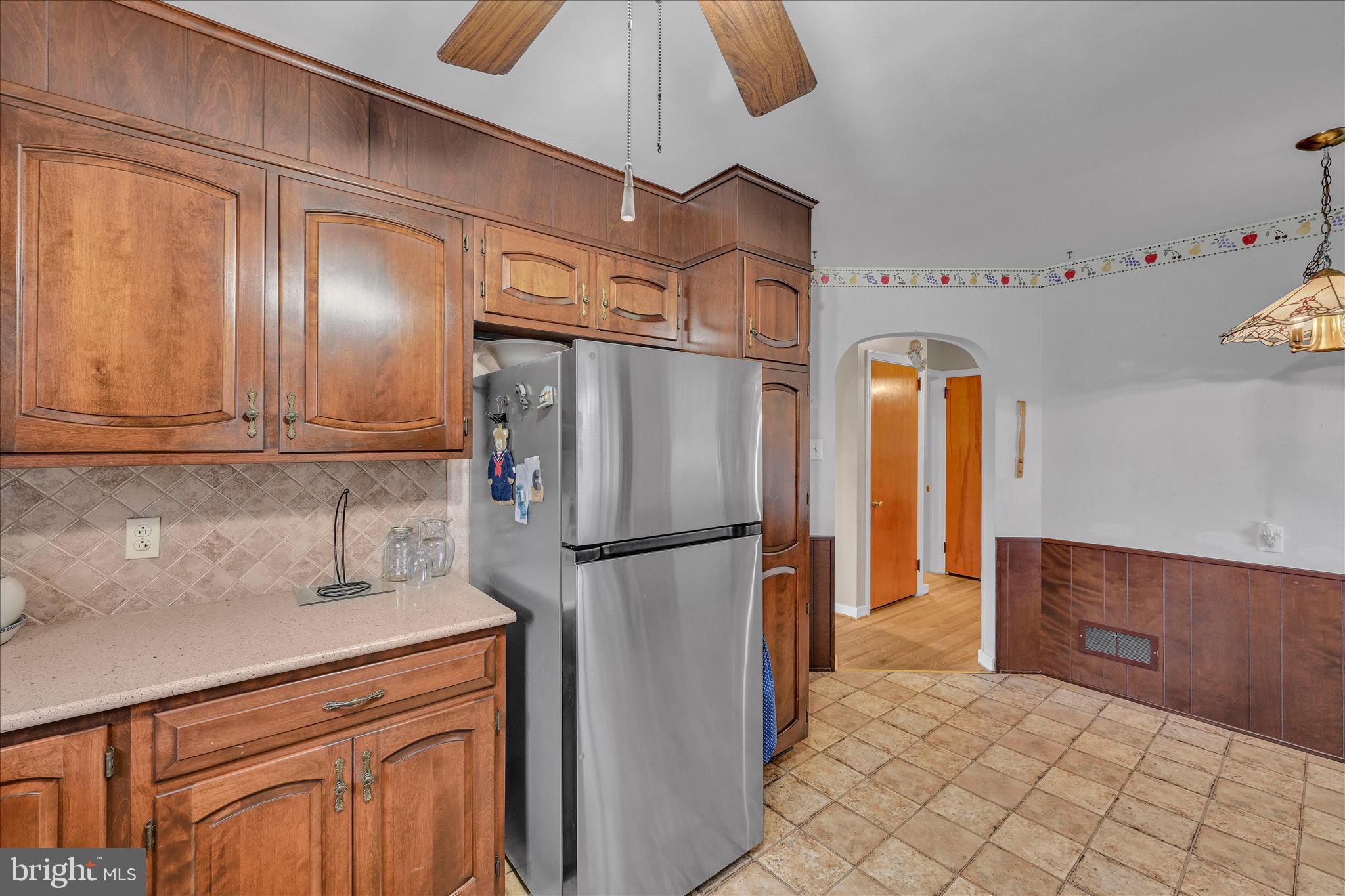 4012 Kutztown Road Temple, PA 19560 - Photo 12 of 30 a kitchen with stainless steel appliances granite countertop a refrigerator and a sink