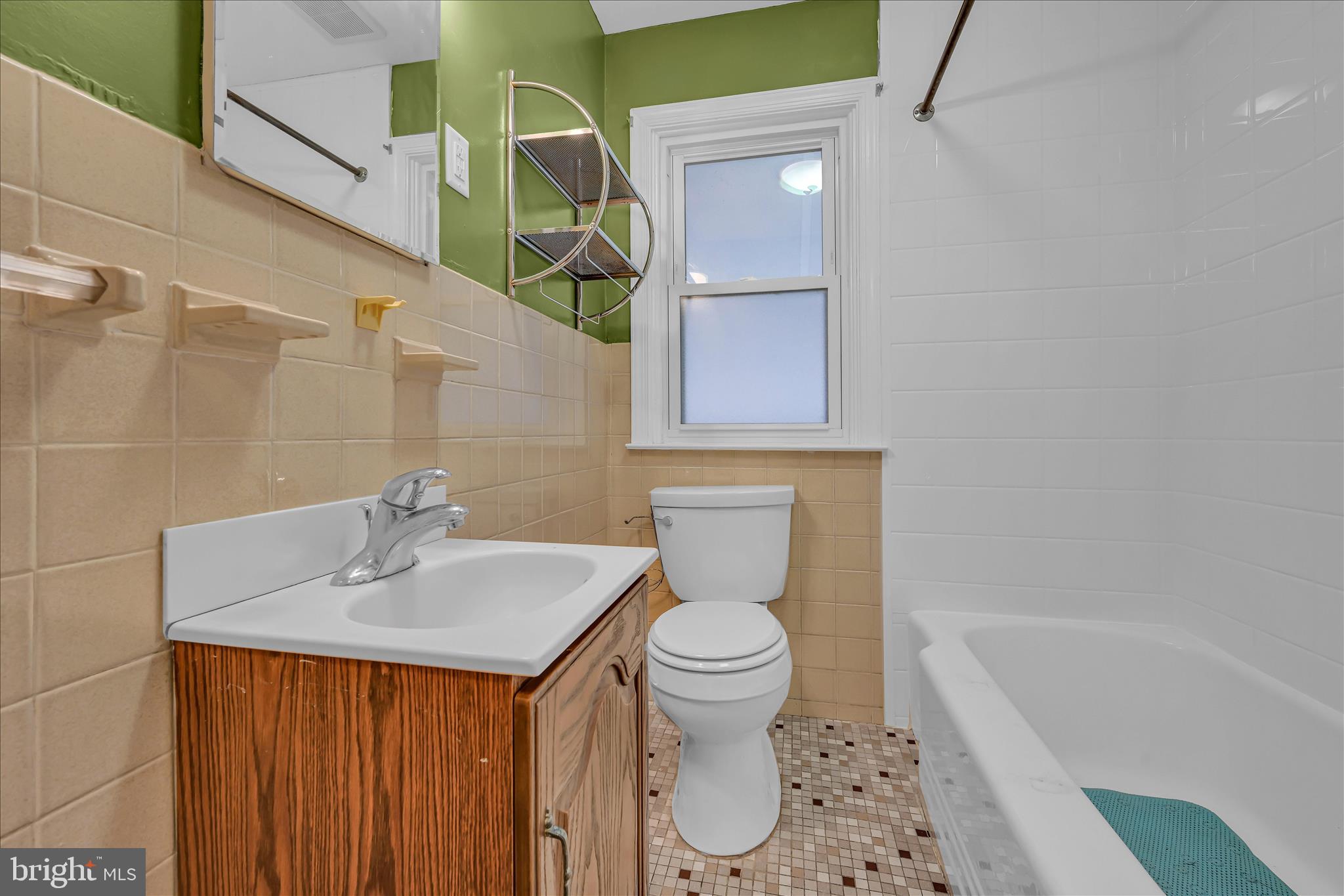 4012 Kutztown Road Temple, PA 19560 - Photo 15 of 30 a bathroom with a sink a toilet and shower