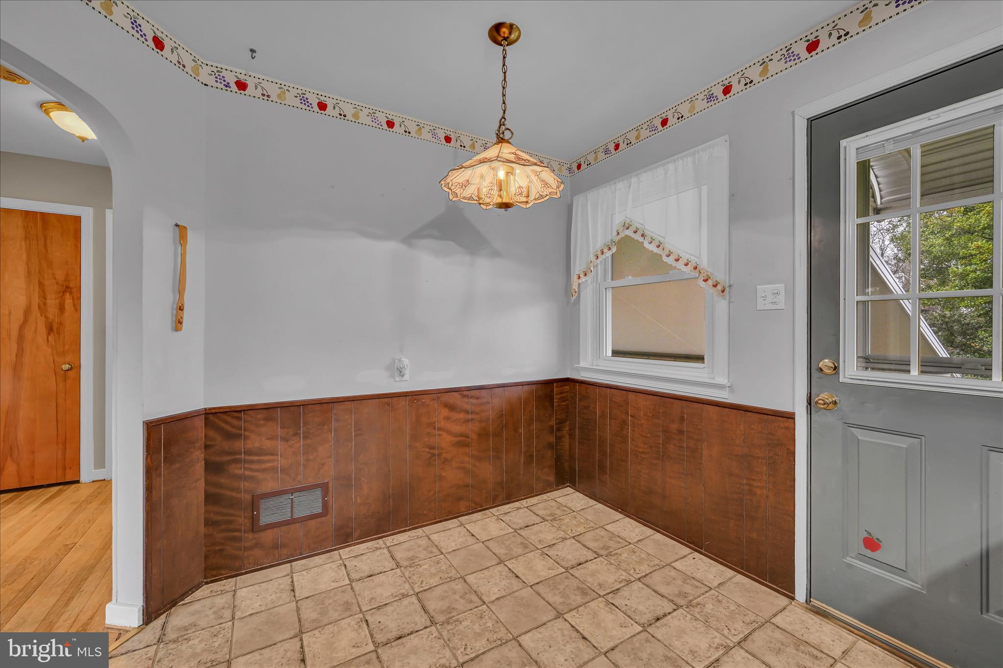 4012 Kutztown Road Temple, PA 19560 - Photo 24 of 30 a view of wooden floor and chandelier in a room