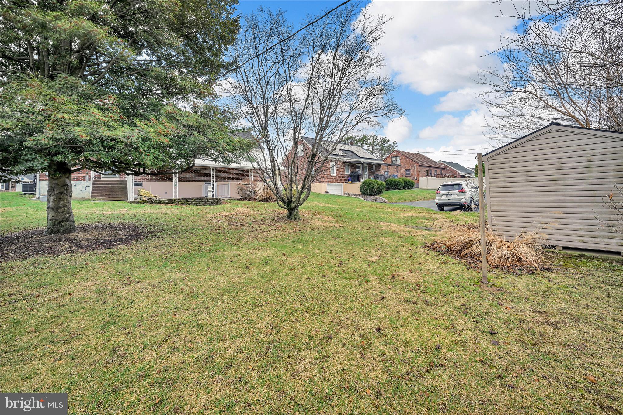 4012 Kutztown Road Temple, PA 19560 - Photo 25 of 30 a backyard of a house with lots of green space