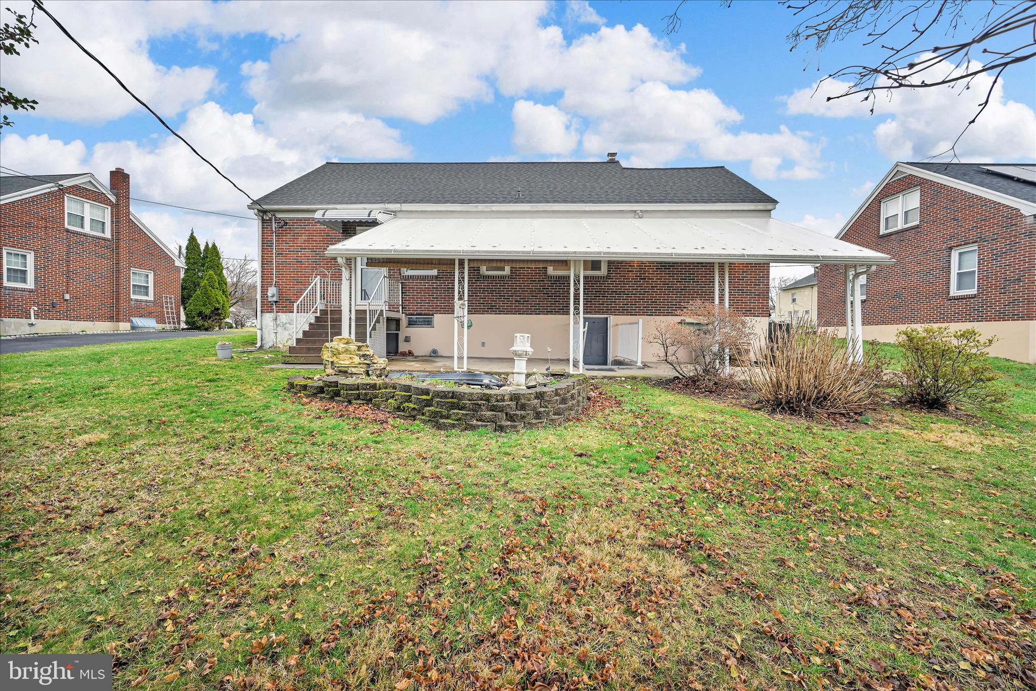 4012 Kutztown Road Temple, PA 19560 - Photo 26 of 30 a front view of a house with garden