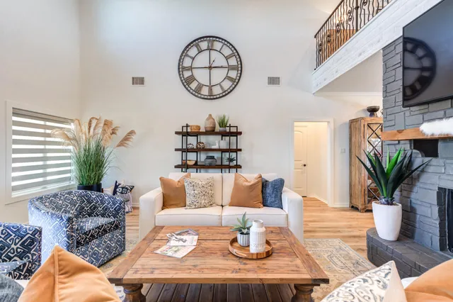 a view of entryway livingroom and hall with wooden floor