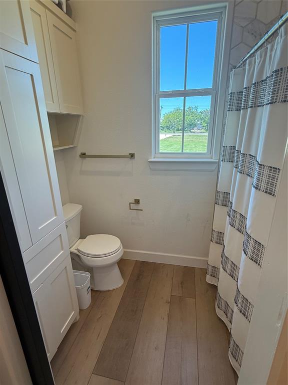 2798 Mockingbird Lane Moody, TX 76557 - Photo 11 of 35 a bathroom with a toilet and a shower