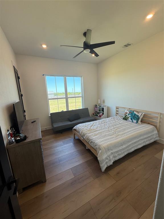 2798 Mockingbird Lane Moody, TX 76557 - Photo 5 of 35 a bedroom with a bed window and couch