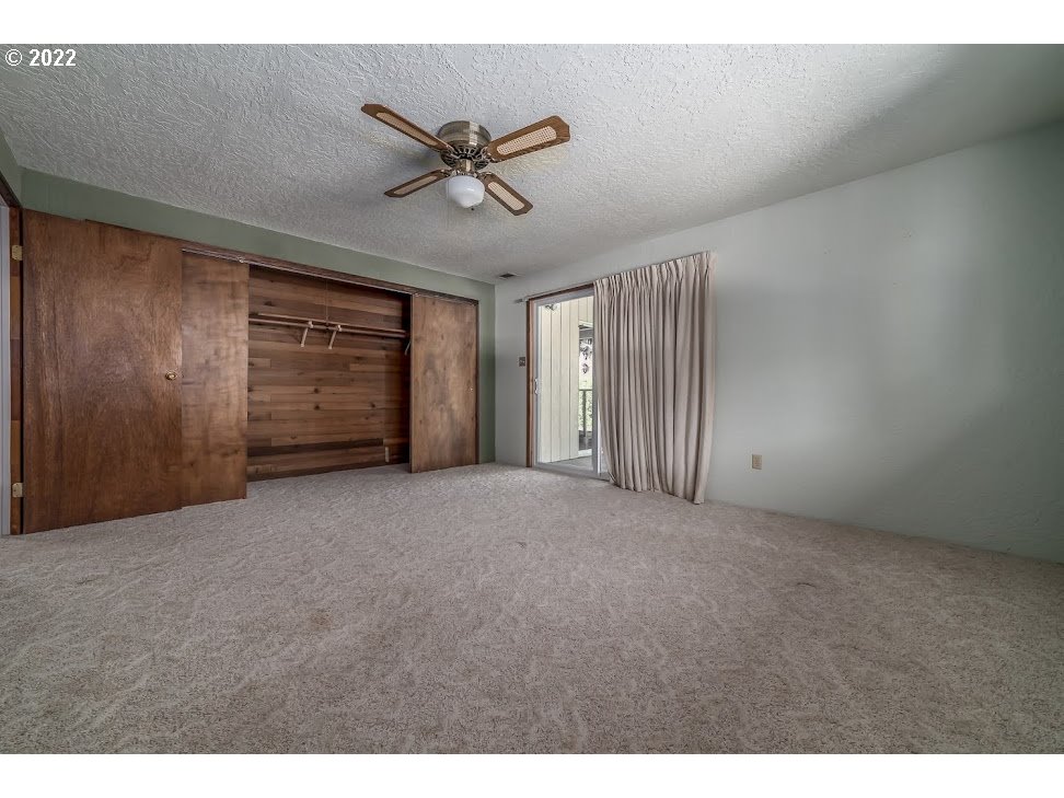 34932 Mathews Road Eugene, OR 97405 - Photo 4 of 31 a view of an empty room and closet area