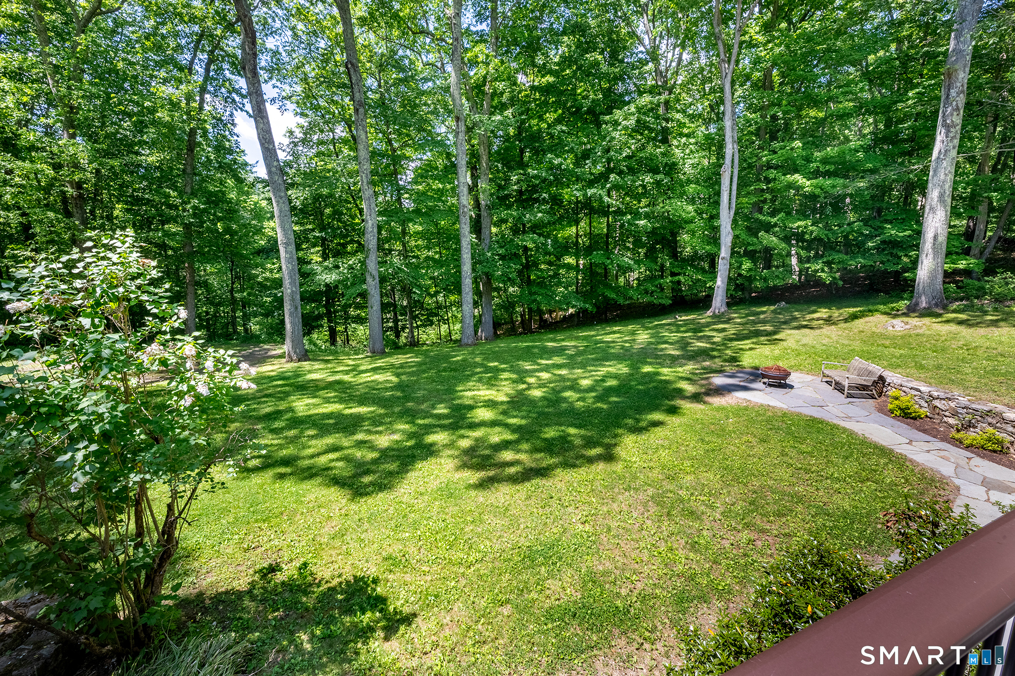 33 Hunter Lane Ridgefield, CT 06877 - Photo 36 of 39 a large green field with lots of trees