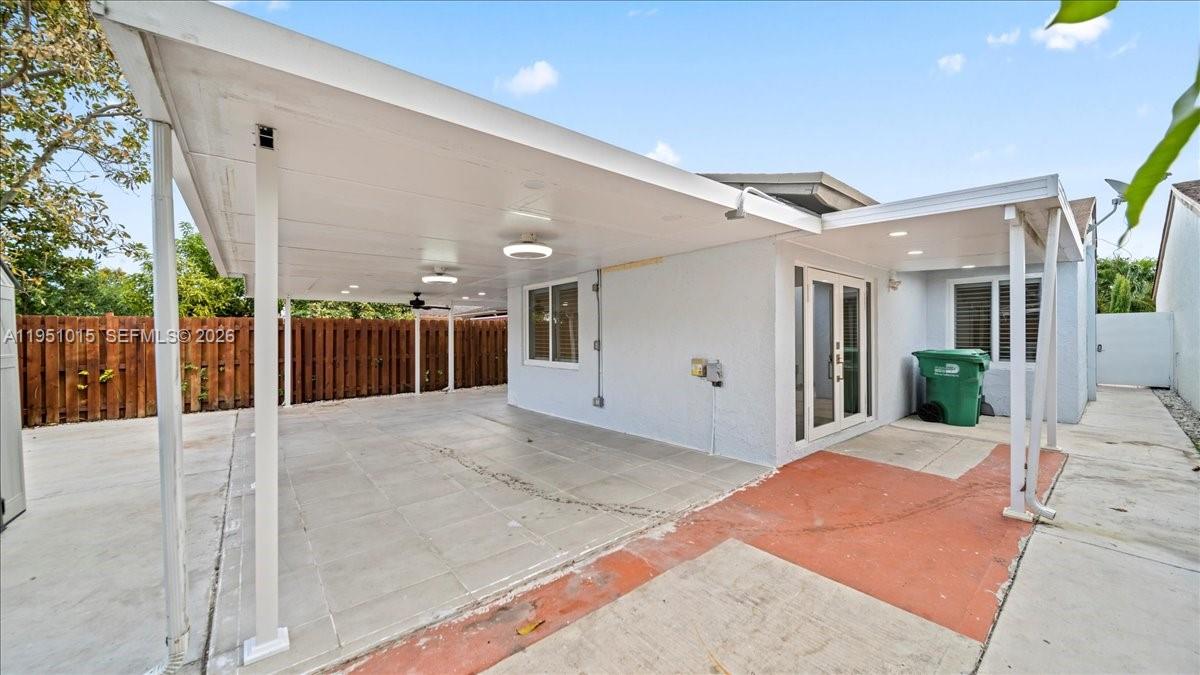 9798 Southwest 147th Place Miami, FL 33196 - Photo 15 of 17 a view of a house with a backyard