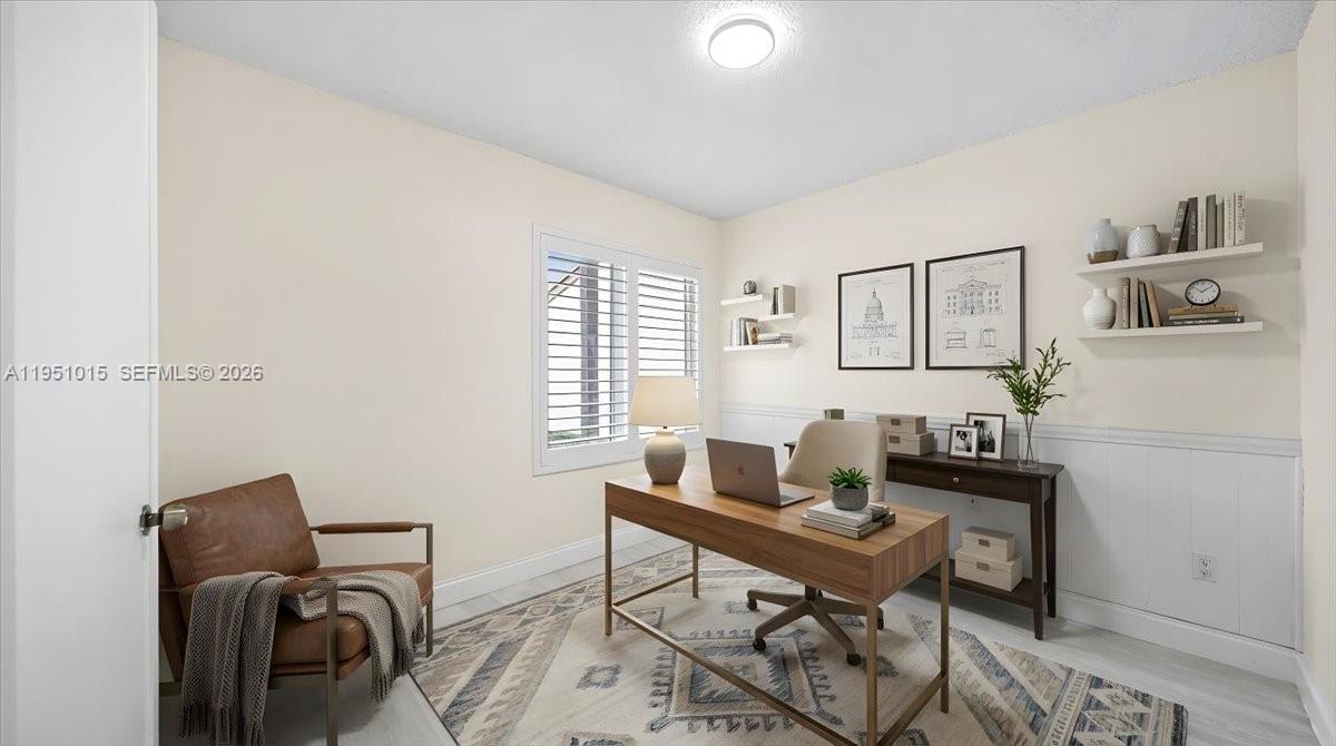 9798 Southwest 147th Place Miami, FL 33196 - Photo 9 of 17 a living room with furniture and a window