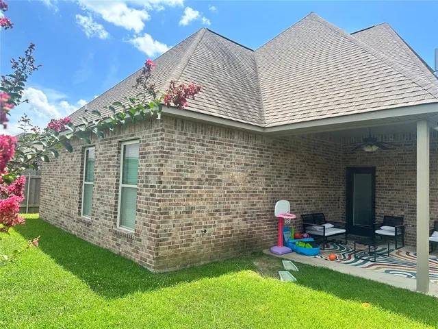 a front view of a house with swing