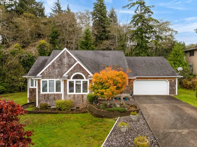 front view of a house with a yard