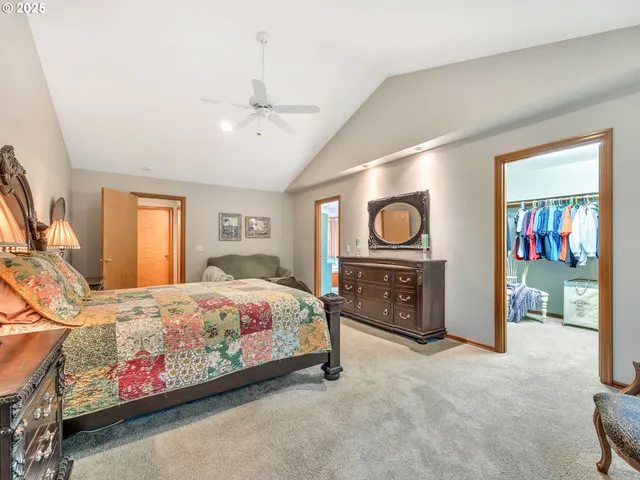 a bedroom with bed and a window