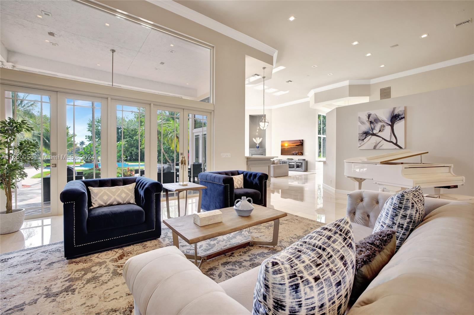 2725 Windmill Ranch Road Weston, FL 33331 - Photo 15 of 99 a living room with furniture and a large window