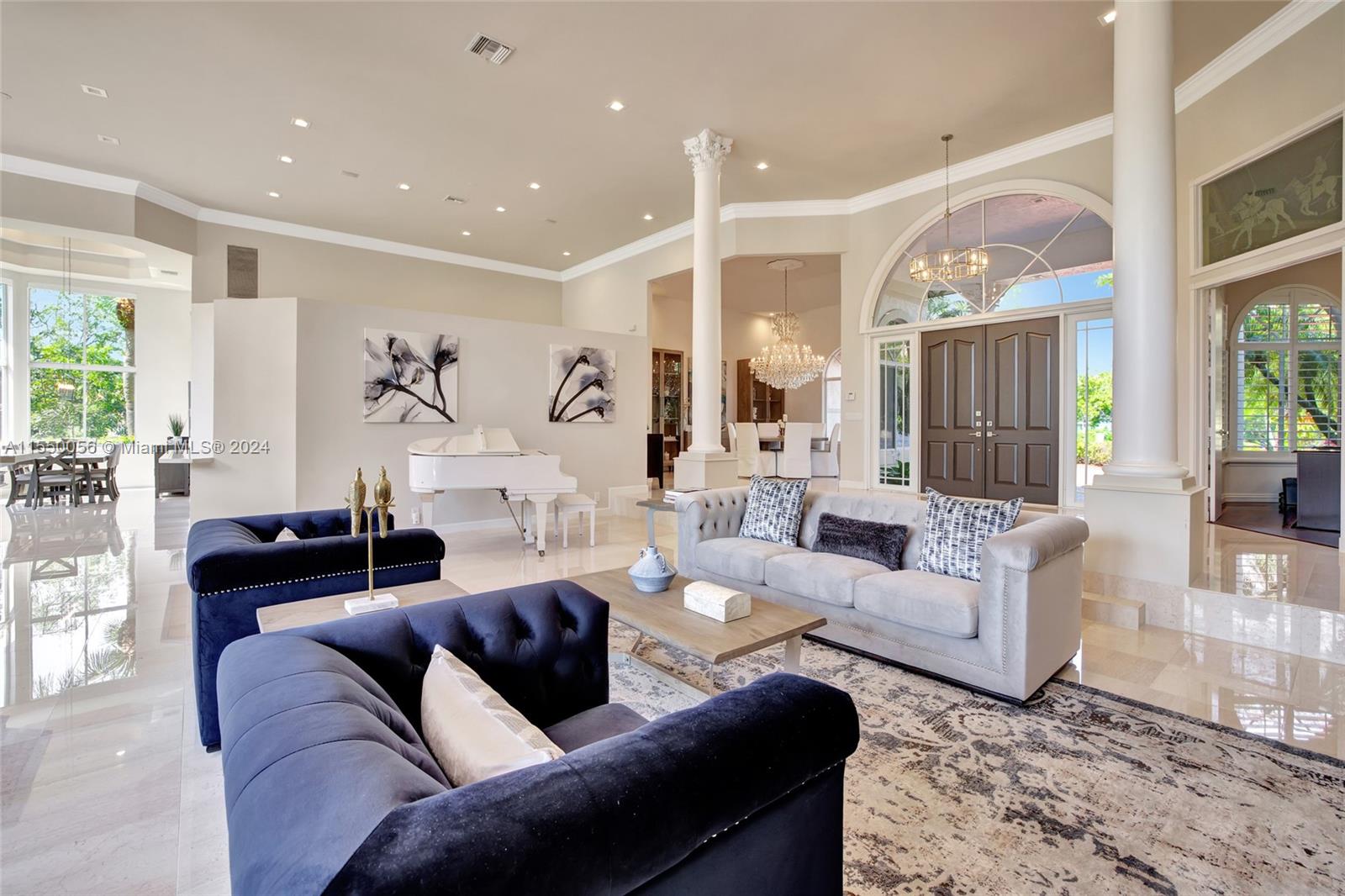 2725 Windmill Ranch Road Weston, FL 33331 - Photo 17 of 99 a living room with furniture and a large window