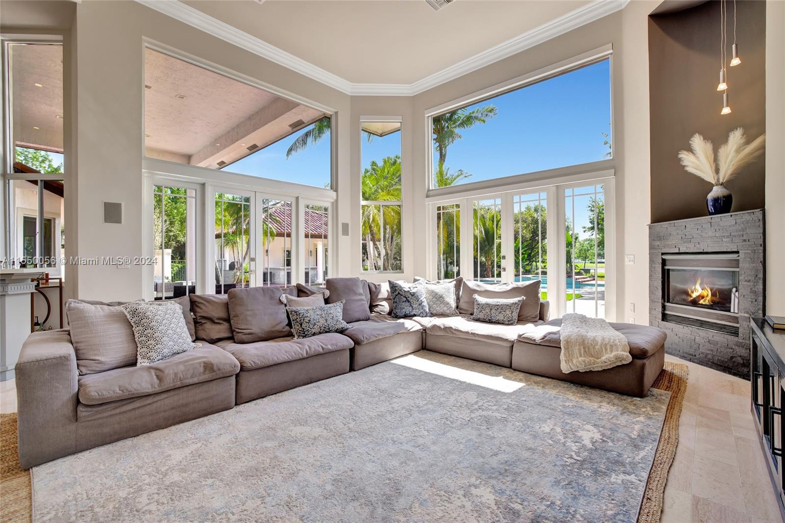 2725 Windmill Ranch Road Weston, FL 33331 - Photo 22 of 99 a living room with furniture and a large window