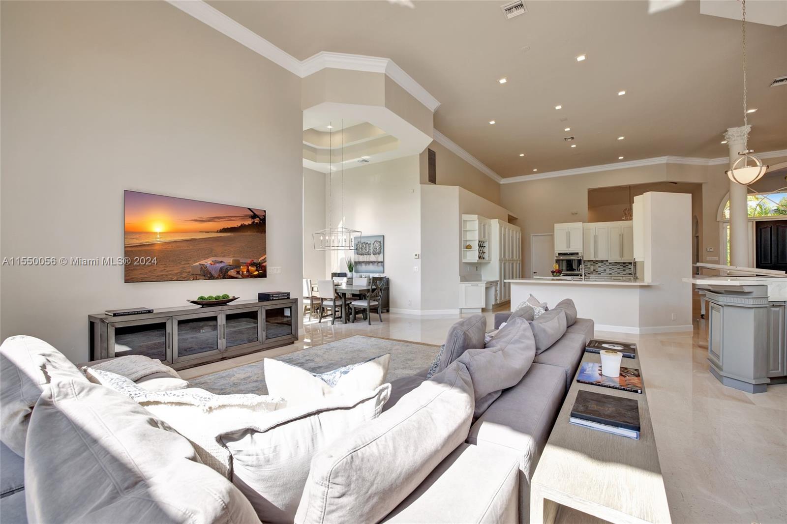 2725 Windmill Ranch Road Weston, FL 33331 - Photo 24 of 99 a living room with furniture and a flat screen tv