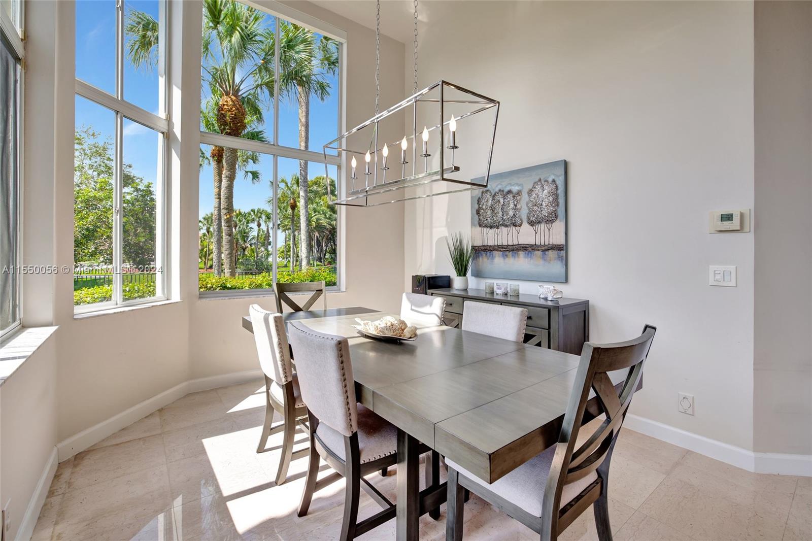 2725 Windmill Ranch Road Weston, FL 33331 - Photo 26 of 99 a view of a dining room with furniture window and outside view