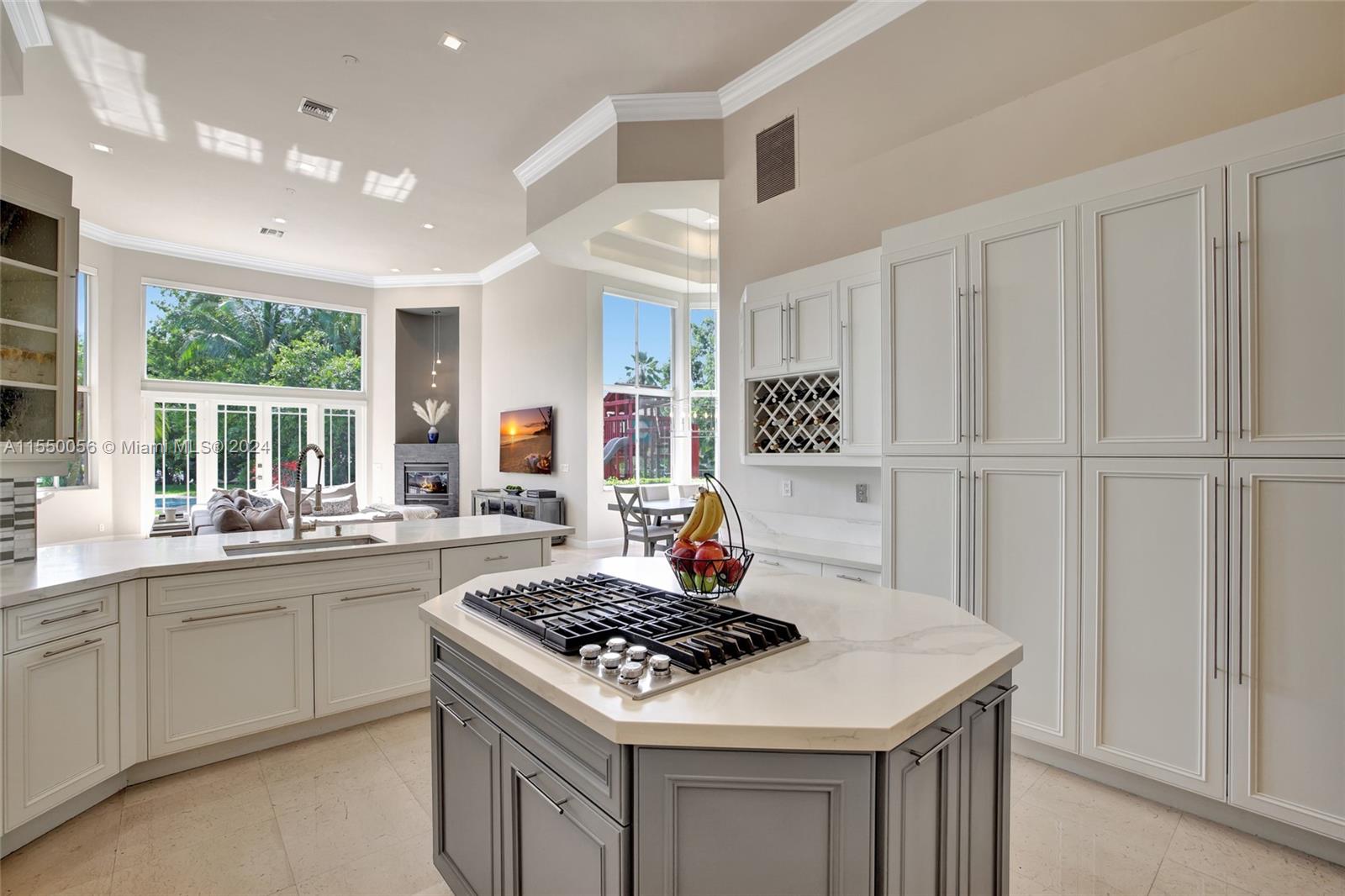 2725 Windmill Ranch Road Weston, FL 33331 - Photo 28 of 99 a kitchen with a stove and a sink