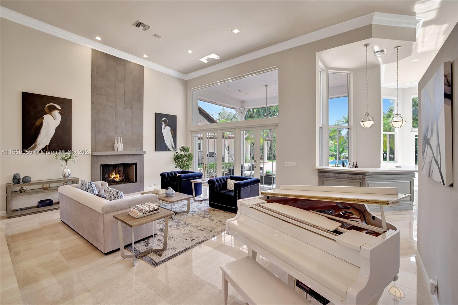 2725 Windmill Ranch Road Weston, FL 33331 - Photo 32 of 99 a living room with furniture fireplace and flat screen tv