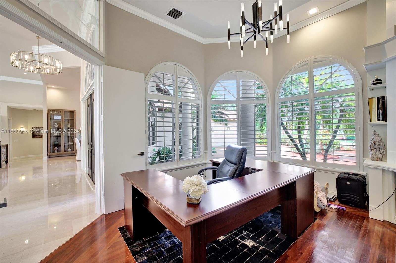 2725 Windmill Ranch Road Weston, FL 33331 - Photo 34 of 99 a view of a livingroom with furniture window and wooden floor