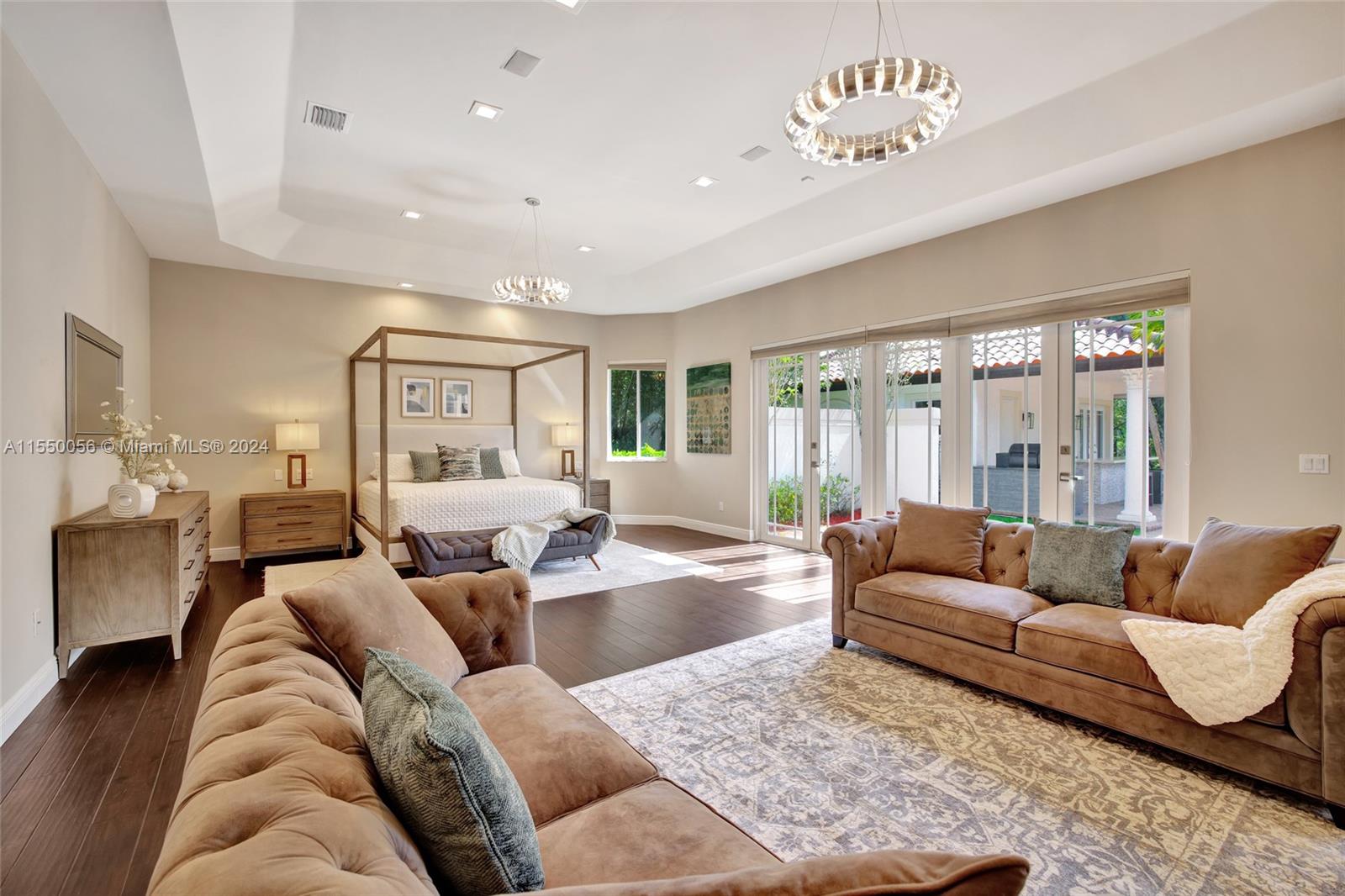 2725 Windmill Ranch Road Weston, FL 33331 - Photo 36 of 99 a living room with furniture ceiling fan and a rug