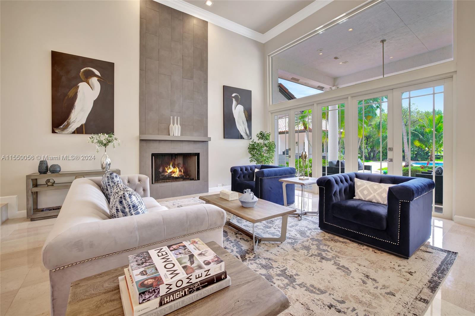 2725 Windmill Ranch Road Weston, FL 33331 - Photo 5 of 99 a living room with furniture fireplace and a large window