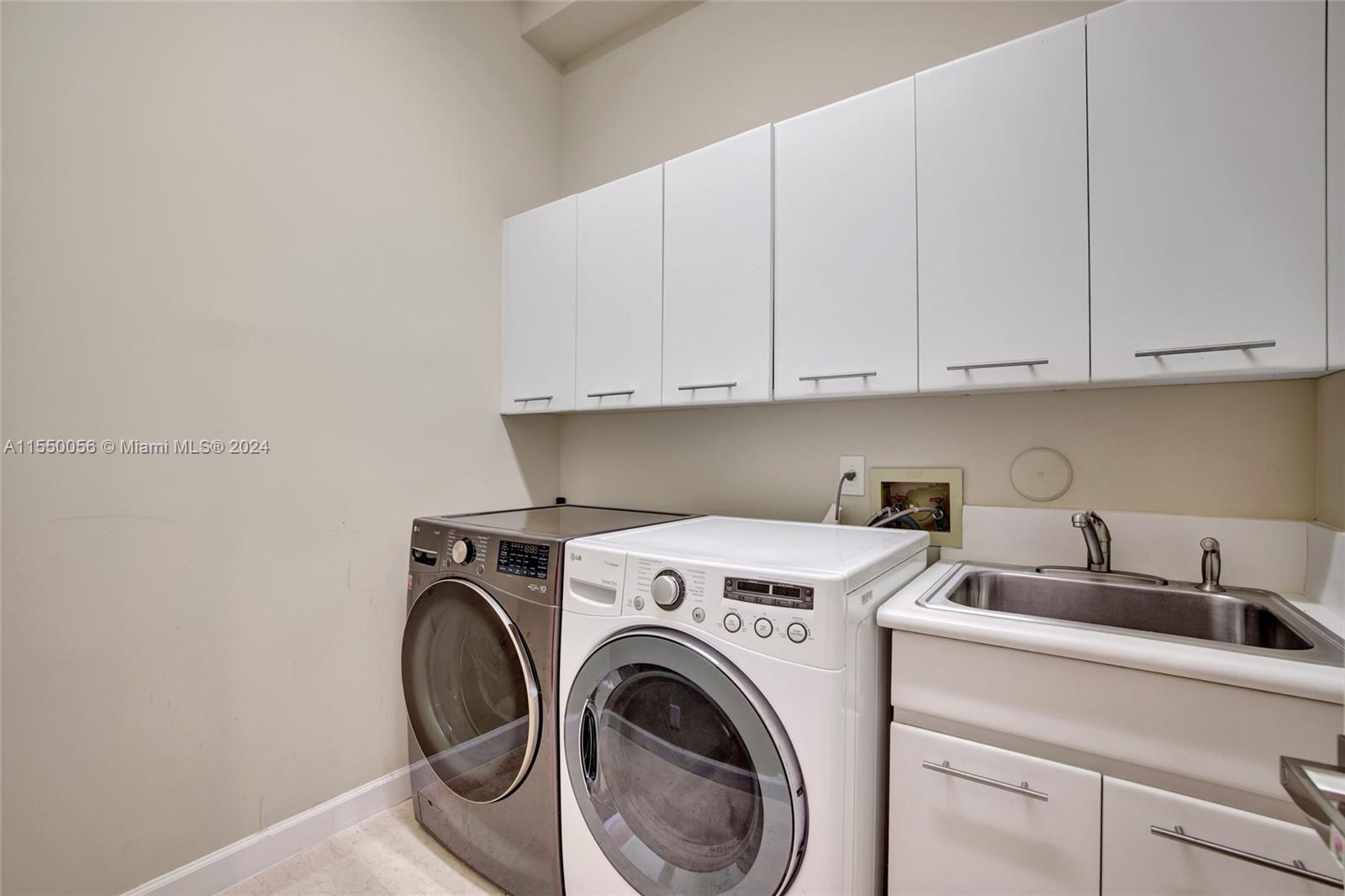 2725 Windmill Ranch Road Weston, FL 33331 - Photo 59 of 99 a utility room with dryer and washer