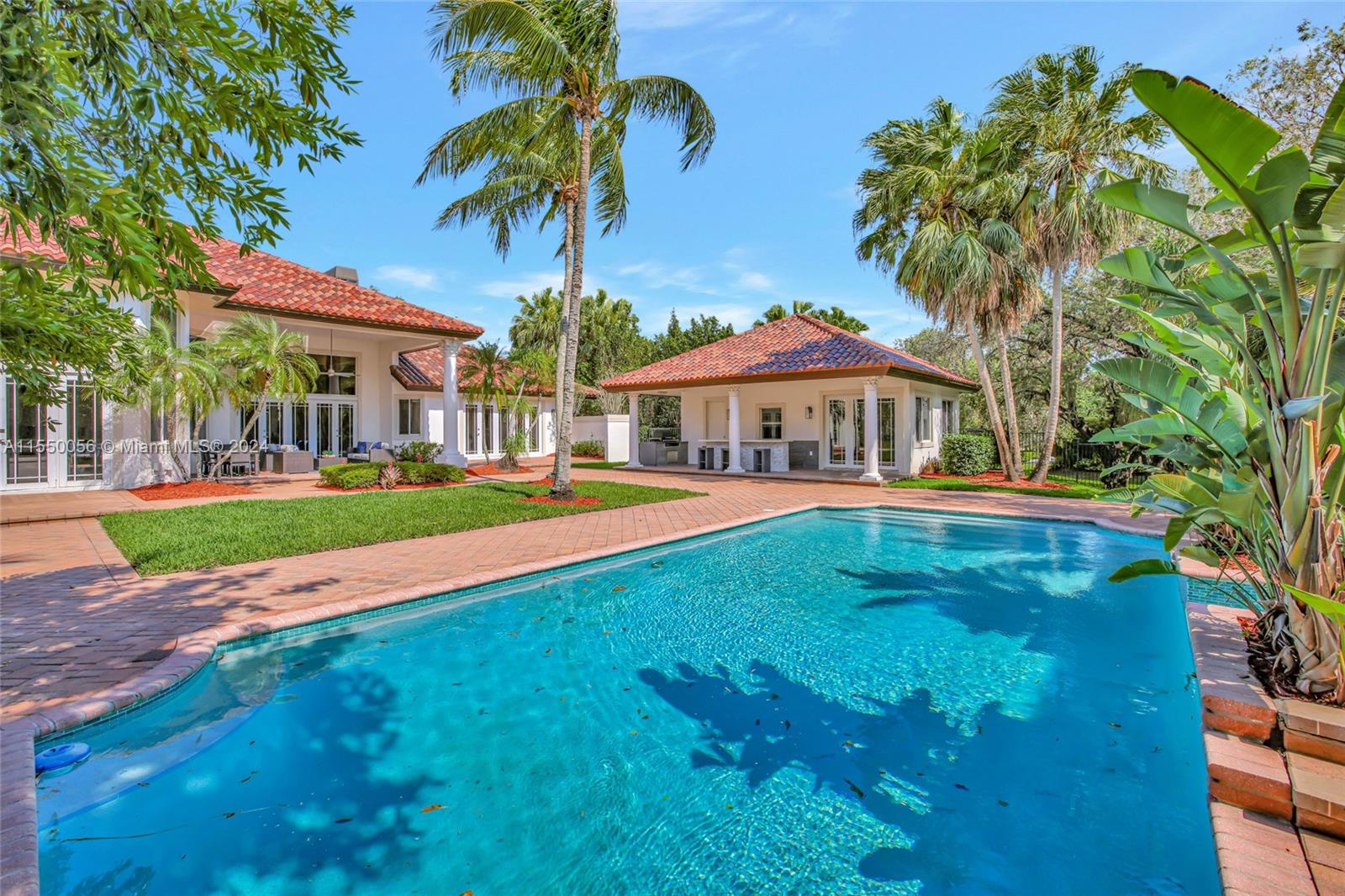 2725 Windmill Ranch Road Weston, FL 33331 - Photo 72 of 99 a view of an house with swimming pool and porch with furniture