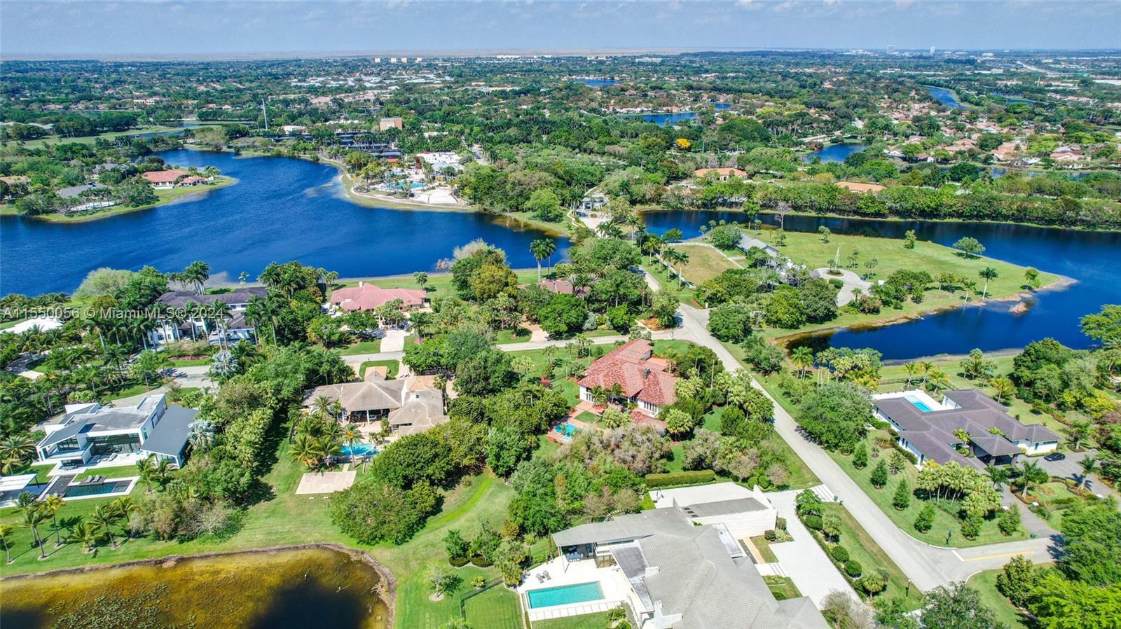 2725 Windmill Ranch Road Weston, FL 33331 - Photo 91 of 99 an aerial view of lake residential house with outdoor space