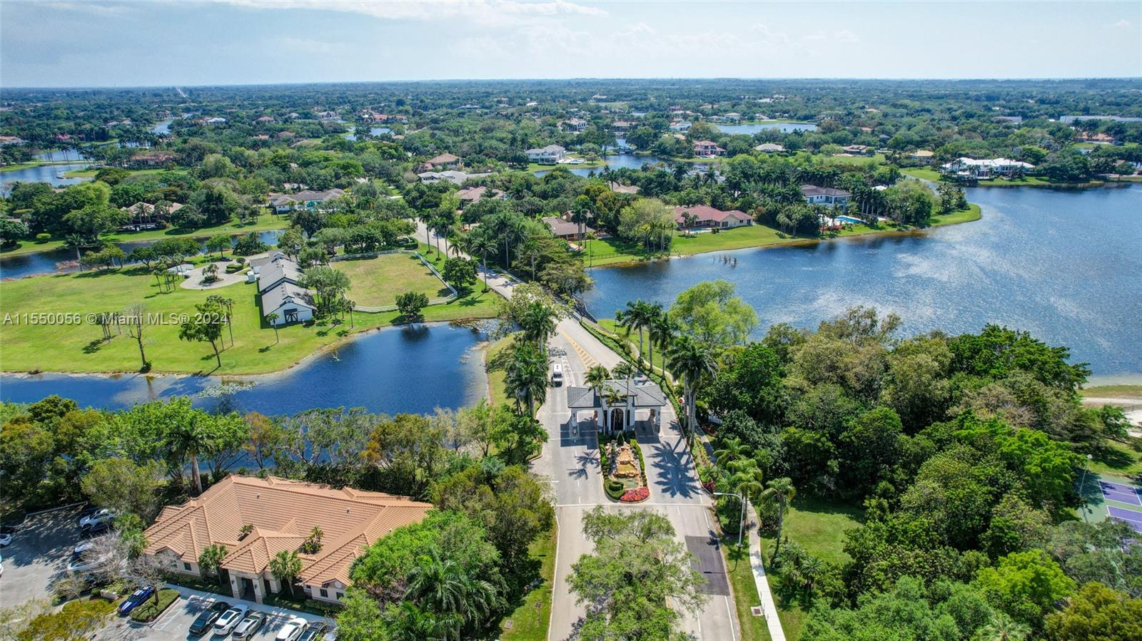 2725 Windmill Ranch Road Weston, FL 33331 - Photo 96 of 99 an aerial view of a houses with a yard