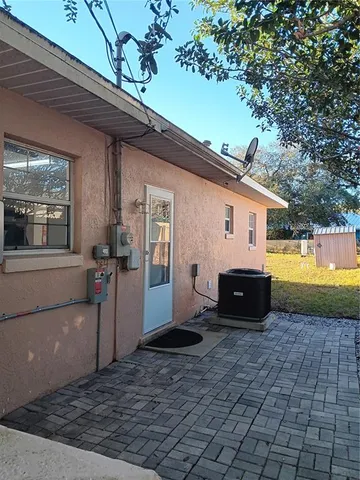 a view of a back yard of the house